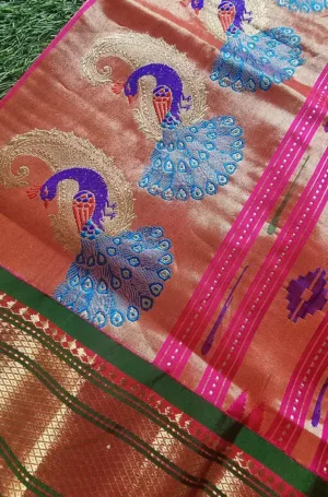 Sea blue and copper handloom tissue silk Paithani saree with intricate peacock motifs and rich zari border