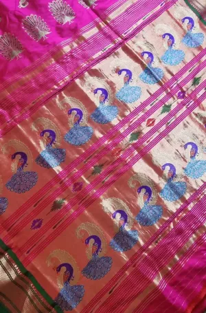 Pink and sea blue handloom tissue silk Paithani saree with intricate peacock motifs and traditional zari weaving