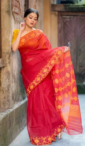 Red and mustard handloom Dhakai Jamdani saree with traditional geometric floral motifs, worn by woman in elegant ethnic style