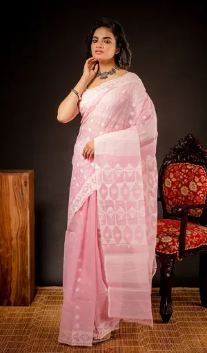 Light pink handloom Dhakai Jamdani saree with delicate white floral motifs and geometric woven pallu, worn by woman