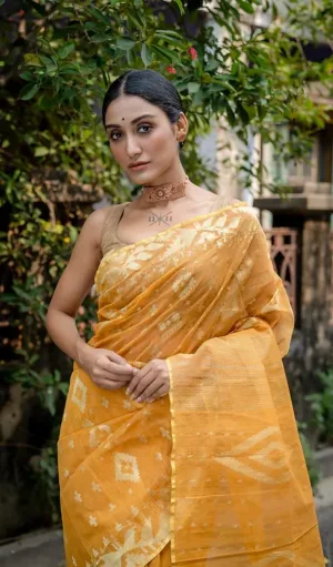 Mustard yellow handloom Dhakai Jamdani saree with traditional geometric and floral motifs, worn by woman
