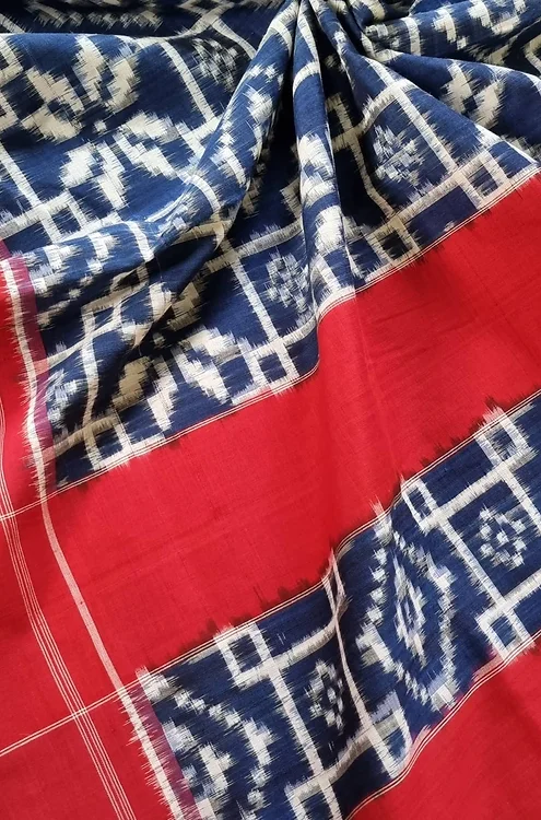 Handloom-Double-Ikat-Cotton-Saree-6 Red and blue handloom double ikat cotton saree with traditional geometric woven patterns