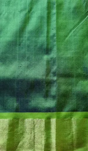 Green handloom fusion Chanderi Paithani saree with subtle dual-tone weave and soft zari border