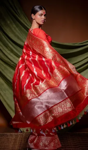 Red handloom Katan silk Banarasi saree with gold kadhua stripe weaving and richly woven floral zari border