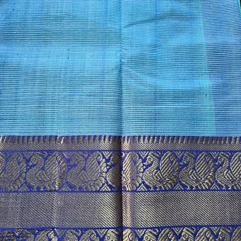 Handloom-Mangalagiri-with-kanchi-border-2 Sky blue Mangalagiri handloom cotton saree with rich blue and gold Kanchi woven border featuring temple motifs.