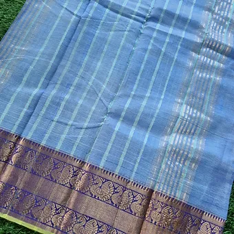 Handloom-Mangalagiri-with-kanchi-border-3 Sky blue Mangalagiri handloom cotton saree with zari stripes and traditional purple Kanchi border.