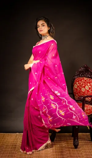 Pink Jamdani saree with intricate patterns worn by a model, showcasing traditional handloom craftsmanship.