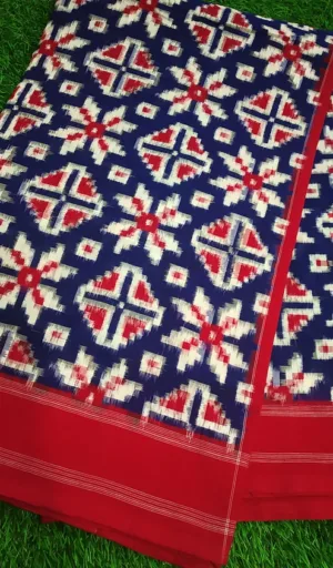 Handloom pure cotton double Ikat Teliya Rumal saree with a blue and red floral pattern and a red border.