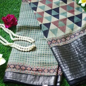 Folded handloom Tussar silk Mangalgiri saree featuring Ajrakh-inspired geometric triangle motifs and check patterns in earthy tones of teal, beige and maroon, paired with a rich black textured zari border