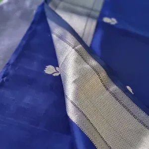 Handloom cotton silk Maheshwari saree in royal blue with a silver zari chevron border and delicate traditional buti motifs