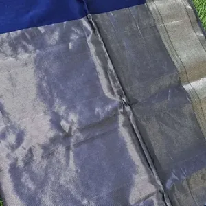 Handloom cotton silk Maheshwari saree in slate grey and steel blue tones, featuring a soft silver zari border and a smooth, lightly lustrous cotton-silk weave