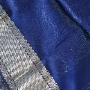 Handloom cotton silk Maheshwari saree in deep royal blue featuring a finely woven silver zari border with classic chevron pattern