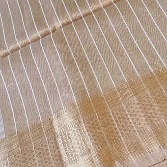 Handloom-cotton-silk-maheshwari-4 Handloom cotton silk Maheshwari saree in beige with white vertical stripes and traditional zari border