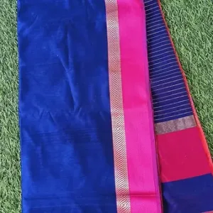 Handloom cotton silk Maheshwari saree in royal blue featuring a contrasting pink resham border, subtle silver zari accent, and fine striped pallu detailing