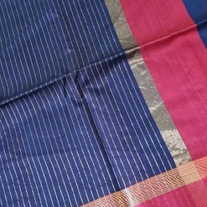 Handloom cotton silk Maheshwari saree in deep navy blue with fine vertical white stripes, paired with a pink resham border and subtle silver zari detailing