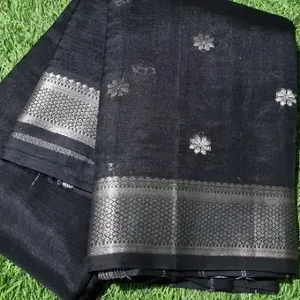 Black handloom cotton silk fabric with a double zari border and intricate floral patterns woven throughout.