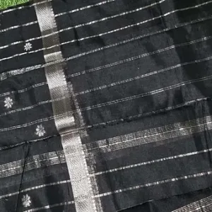 Handloom cotton silk Mangalagiri fabric with a double zari border, featuring intricate patterns and a black base.
