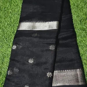 Black handloom cotton silk fabric with a double zari border and floral motifs, showcasing intricate weaving details.