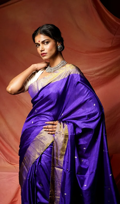 Handloom-fusion-chanderi-paithani-2 Royal purple handloom fusion Chanderi Paithani saree with gold zari border, worn by woman in elegant traditional style