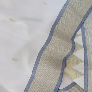 Handloom pure cotton Paithani saree with intricate border design and subtle motifs on a white background.