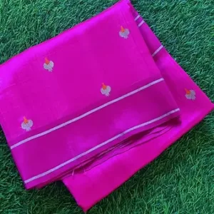 Handloom pure silk Chanderi fabric in vibrant pink with intricate floral embroidery and silver detailing.