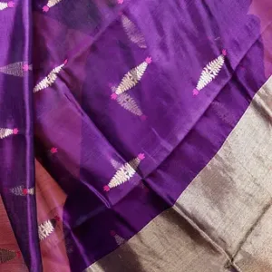 Purple handloom pure silk Chanderi saree with silver zari border and leaf butti motifs, displayed flat; elegant lightweight traditional silk saree.