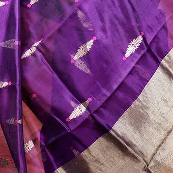 Handloom-pure-silk-chanderi-2 Purple handloom pure silk Chanderi saree with silver zari border and leaf butti motifs, displayed flat; elegant lightweight traditional silk saree.