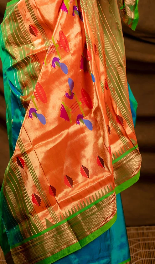Handloom-pure-silk-paithani-1 Teal blue and orange handloom pure silk Paithani saree with multicolour peacock motifs and traditional zari border
