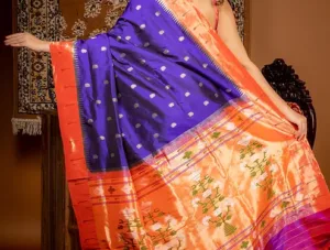 Royal blue and orange handloom pure silk Paithani saree with traditional zari motifs and floral pallu design
