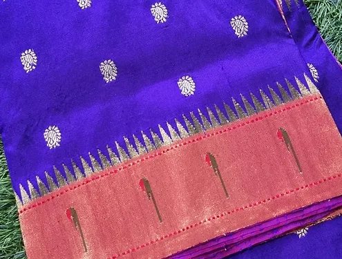 Handloom-pure-silk-paithani-4 Royal blue handloom pure silk Paithani saree with copper zari border and traditional woven motifs