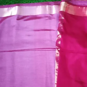 Mulberry silk Maheshwari saree with a combination of purple and pink colors, featuring a contrasting border.