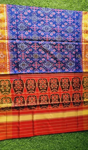 Mulberry silk handcrafted single ikat Patola saree in blue and red with traditional geometric woven patterns