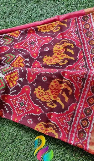 Mulberry silk handcrafted single ikat Patola saree in maroon and red with traditional animal and geometric motifs