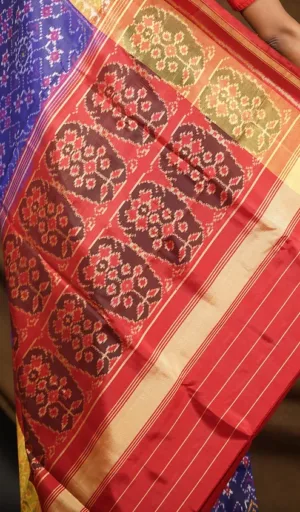 Mulberry silk handcrafted single ikat Patola saree with red and gold woven border and traditional floral motifs