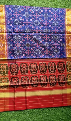 Mulberry silk handcrafted single ikat Patola saree in royal blue and red with traditional geometric woven patterns