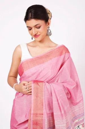 Soft pink handloom pure cotton Paithani saree with subtle woven texture and elegant traditional border, worn by woman