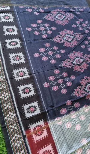 Black handloom Odisha ikat cotton saree with pink floral motifs and traditional woven border